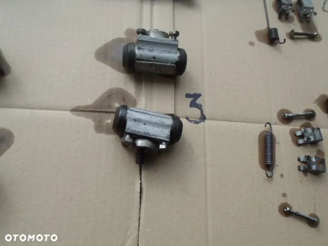 bęben szczęki cylinderek rozpierak hamulec tylny osłona tarcza kotwiczna kostka abs z zawieszenie tył toyota yaris II III 2 3 jak nowe - 33