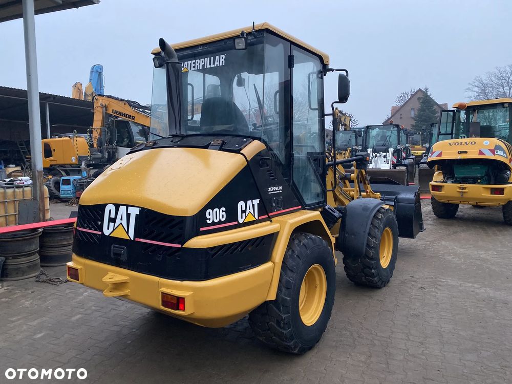 Caterpillar CAT 906, ŁYŻKA + WIDŁY, SUPER STAN, z NIEMIEC, SERWISOWANA W CAT - 7