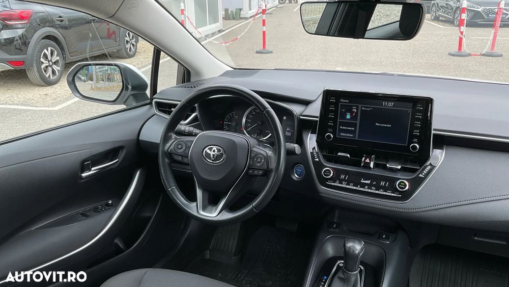 Toyota Corolla 1.8 HSD Business - 34