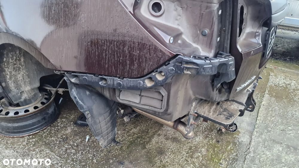 CHEVROLET CRUZE KOMBI ŚLIZG ZDERZAKA LEWY TYŁ - 1