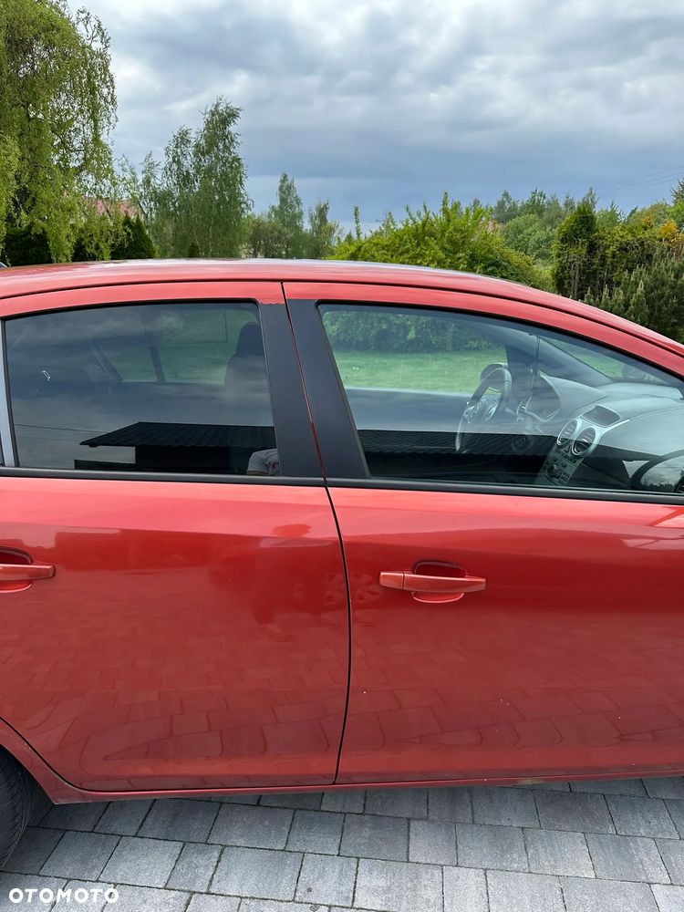 Opel Corsa 1.2 16V Cosmo - 7