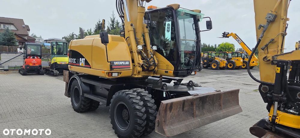 Caterpillar <<CAT M313C, Rotatilt Engcon z 2017r szczypce, szybka skrzynia, centralne smarowanie,TOP!!>> - 17