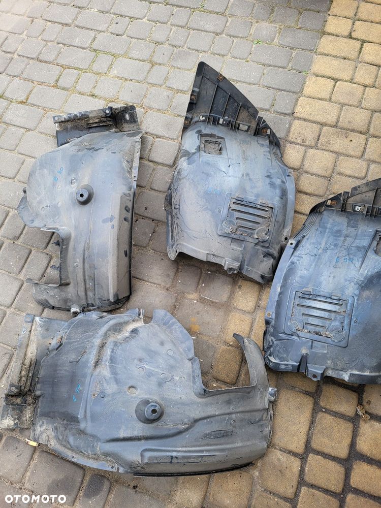Nadkola przednie bmw e90 07r kompletne 2szt