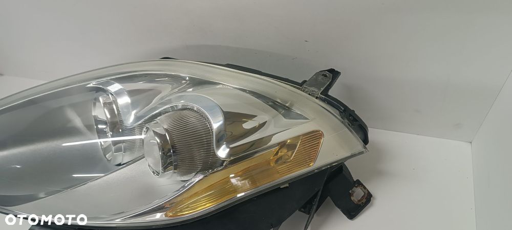 FIAT BRAWO 2 II LAMPA PRZÓD PRZEDNIA LEWA  EUROPA 51757538 - 9