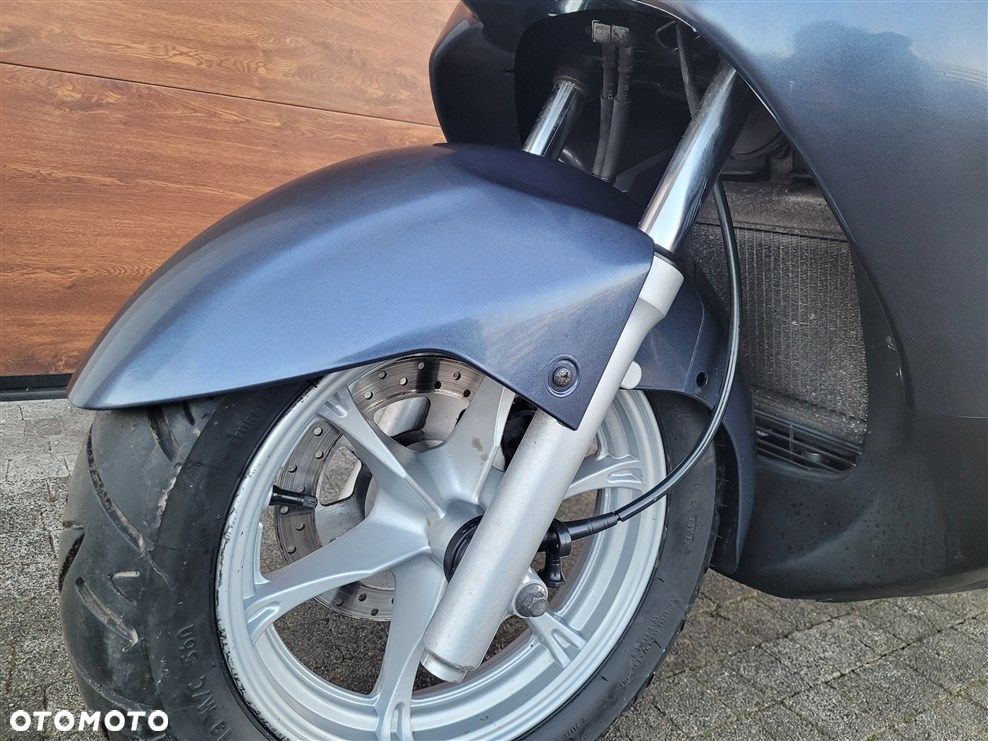 Suzuki Burgman - 7