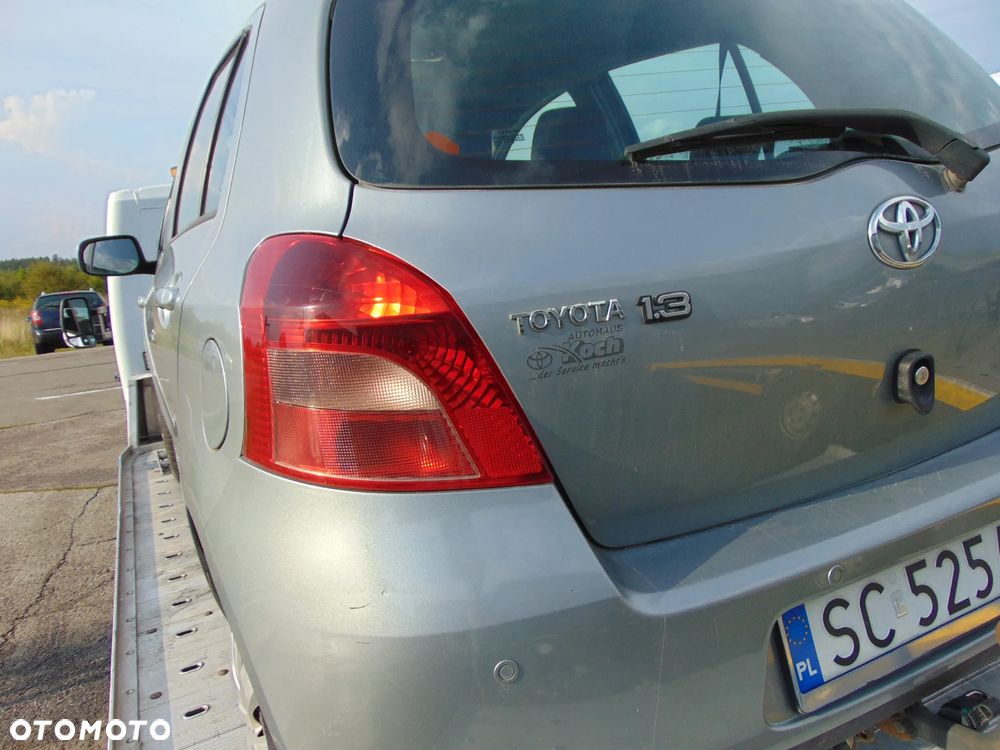 ZDERZAK TYŁ TOYOTA YARIS II 1F8 PDC - 2