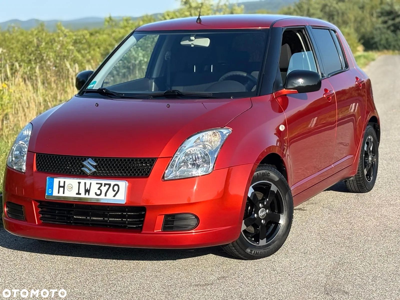 Suzuki Swift 1.3 Sunlight Edition - 1