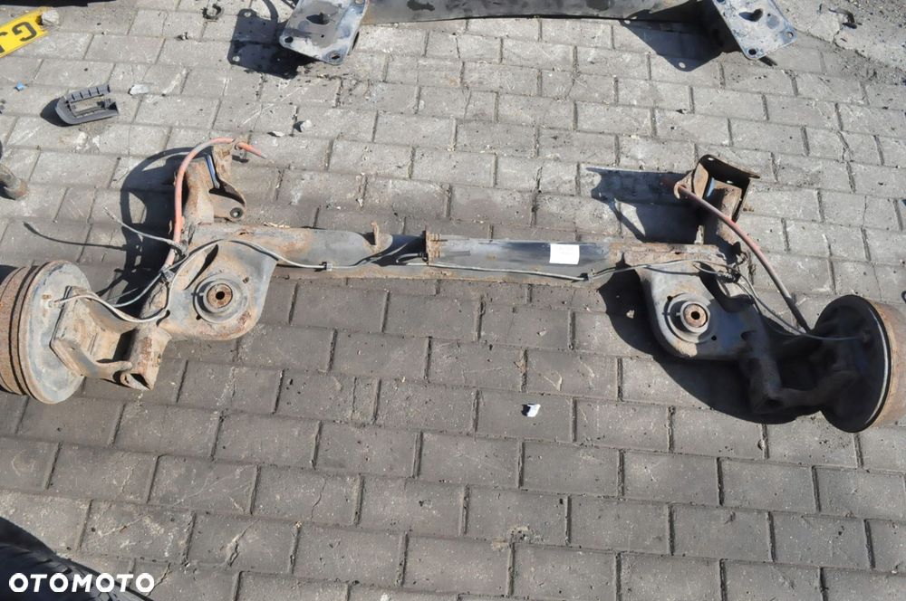 DACIA DUSTER ZAWIESZENIE BELKA TYŁ - 1