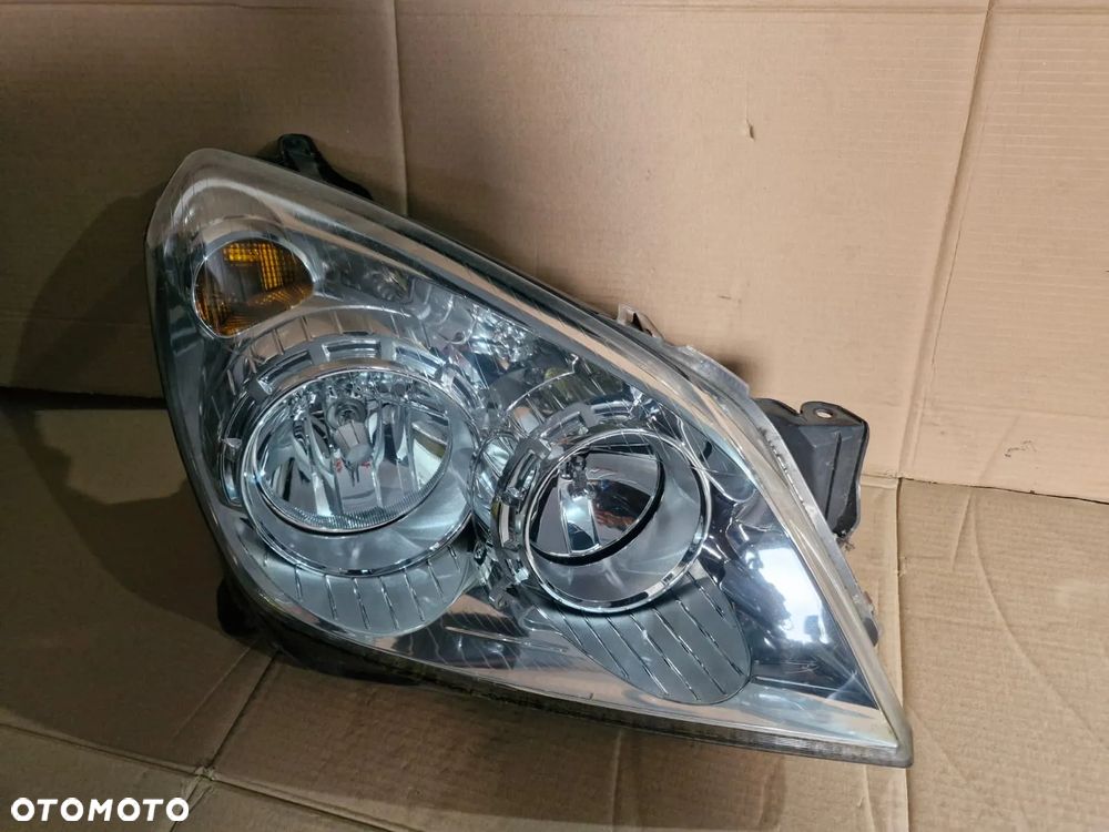 Lampa prawa przednia przód Opel Astra H III LIFT EUROPA