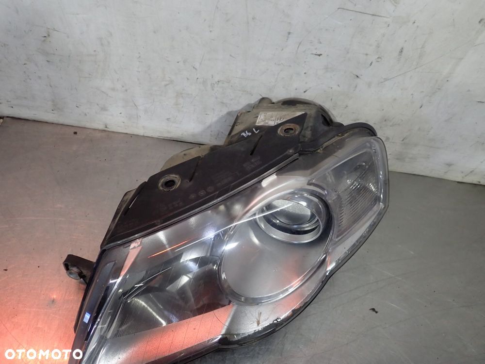 LAMPA LEWA PRZEDNIA TYC VOLKSWAGEN PASSAT B6 - 2