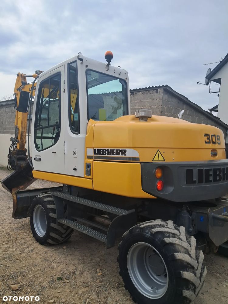 Liebherr 309 Litronic - 3