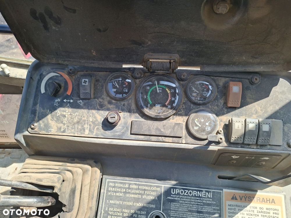 Caterpillar 428 C 4X4 - 14