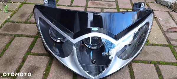 TRIUMPH SPRINT ST 1050 Lampa przód Reflektor