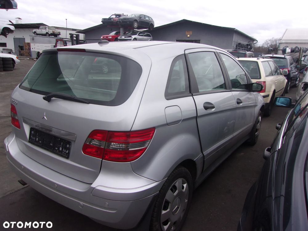 ZAMEK DRZWI PRAWY LEWY Przód  Mercedes W245 B-klasa - 2