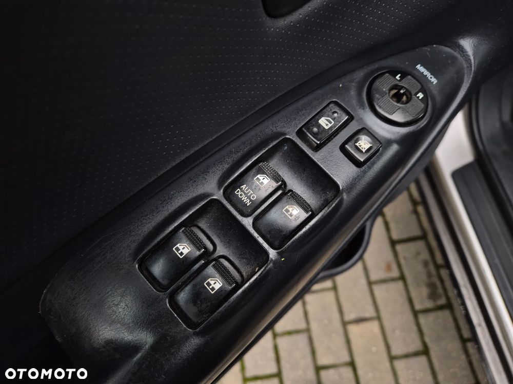 Hyundai Tucson 2.0 CRDi Elegance + - 12