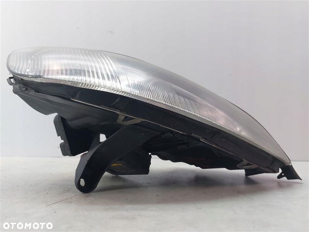 Reflektor lampa przód prawa Opel Omega B FL - 6