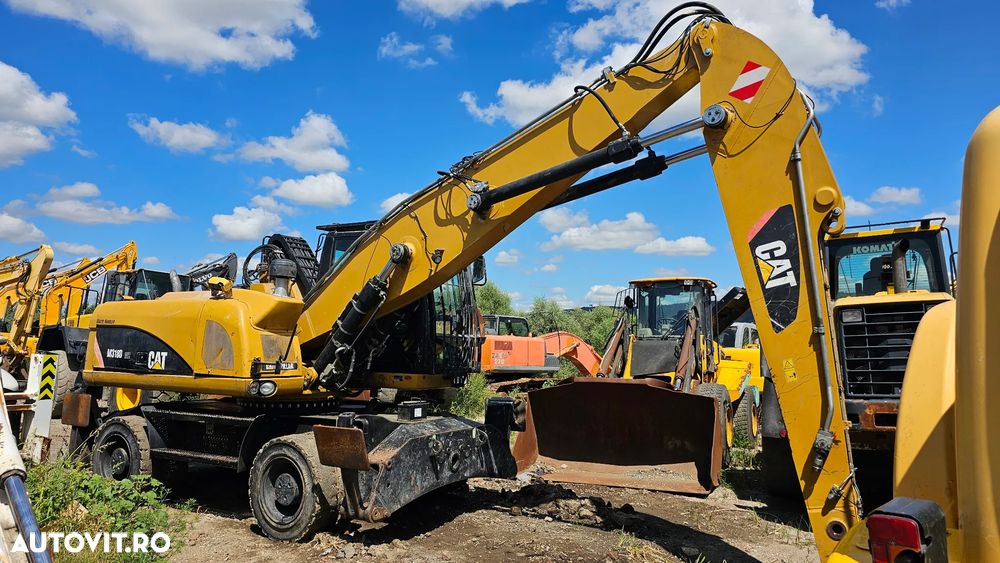 Caterpillar CAT 318 D Excavator pe roti - 4