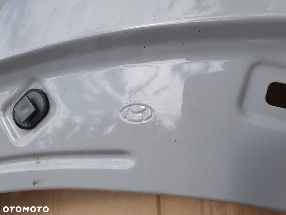 HYUNDAI IONIQ 5 V BŁOTNIK LEWY 2021 - 2