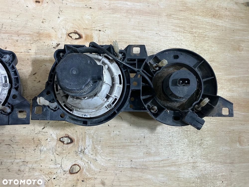 LAMPA BMW E30 HELLA PRAWA UŚMIECH REFLEKTOR E32 E34 - 6