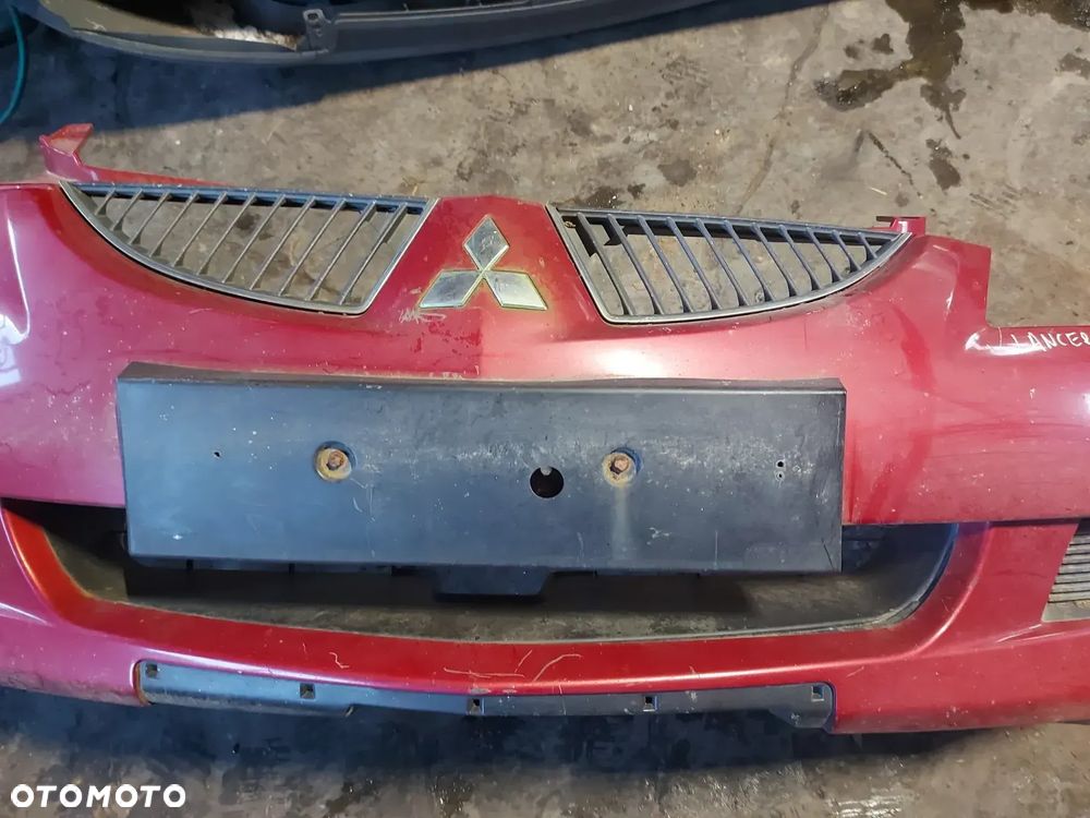 Zderzak przód przedni  MITSUBISHI LANCER VIII 04' kod R20 - 4