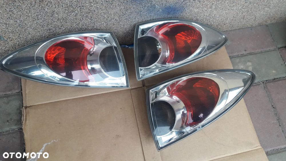 Mazda 6 02-07 GG sedan HB  lampa tylna tył  lewa prawa w błotniku - 4