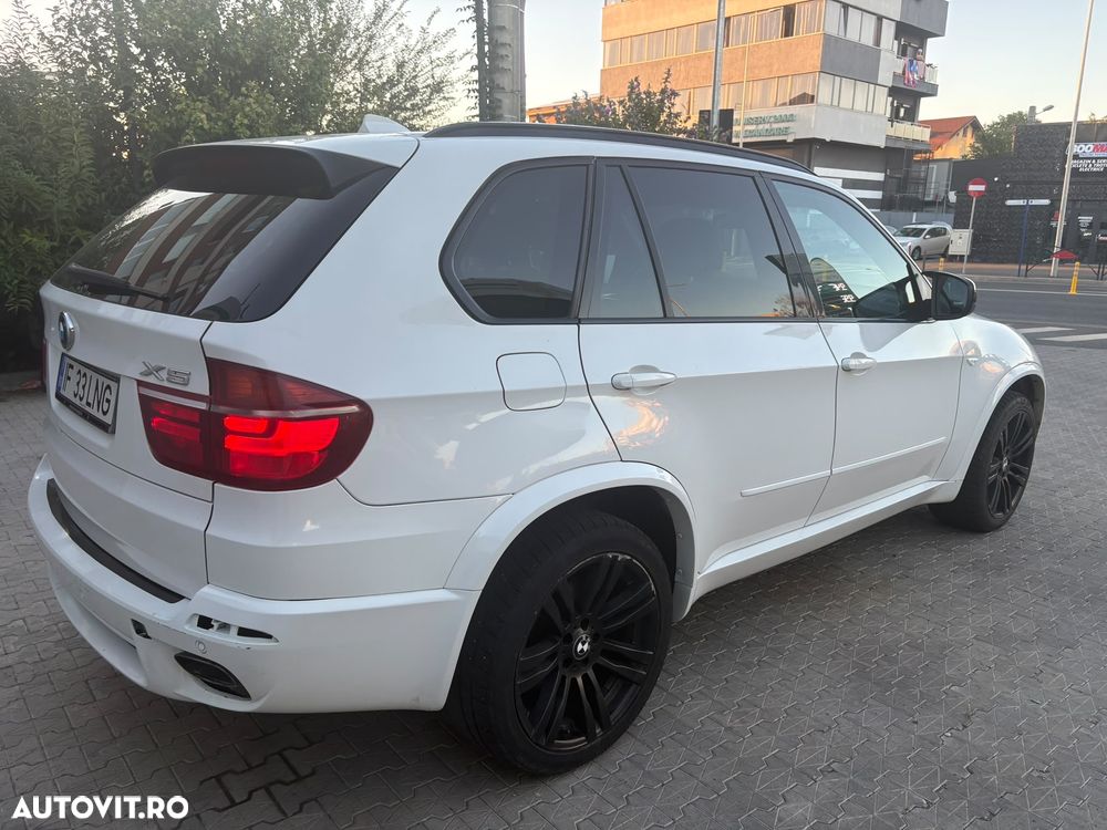 BMW X5 2011 — imagine 11