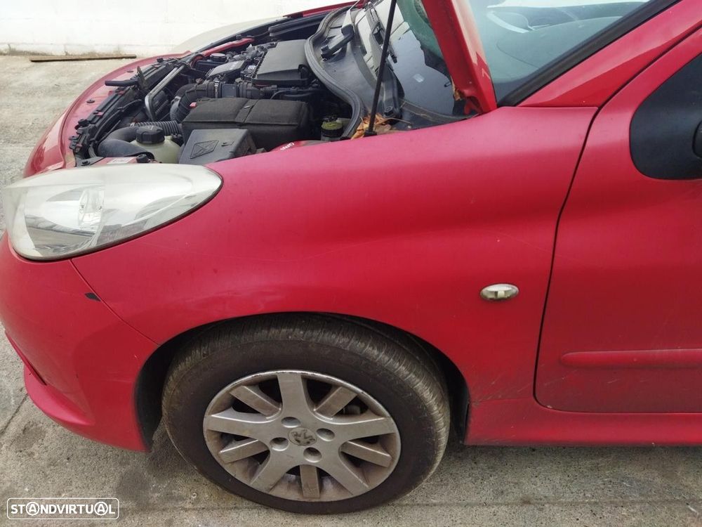 GUARDA-LAMAS FRONTAL ESQUERDO PEUGEOT 206+ 2010 - - 3