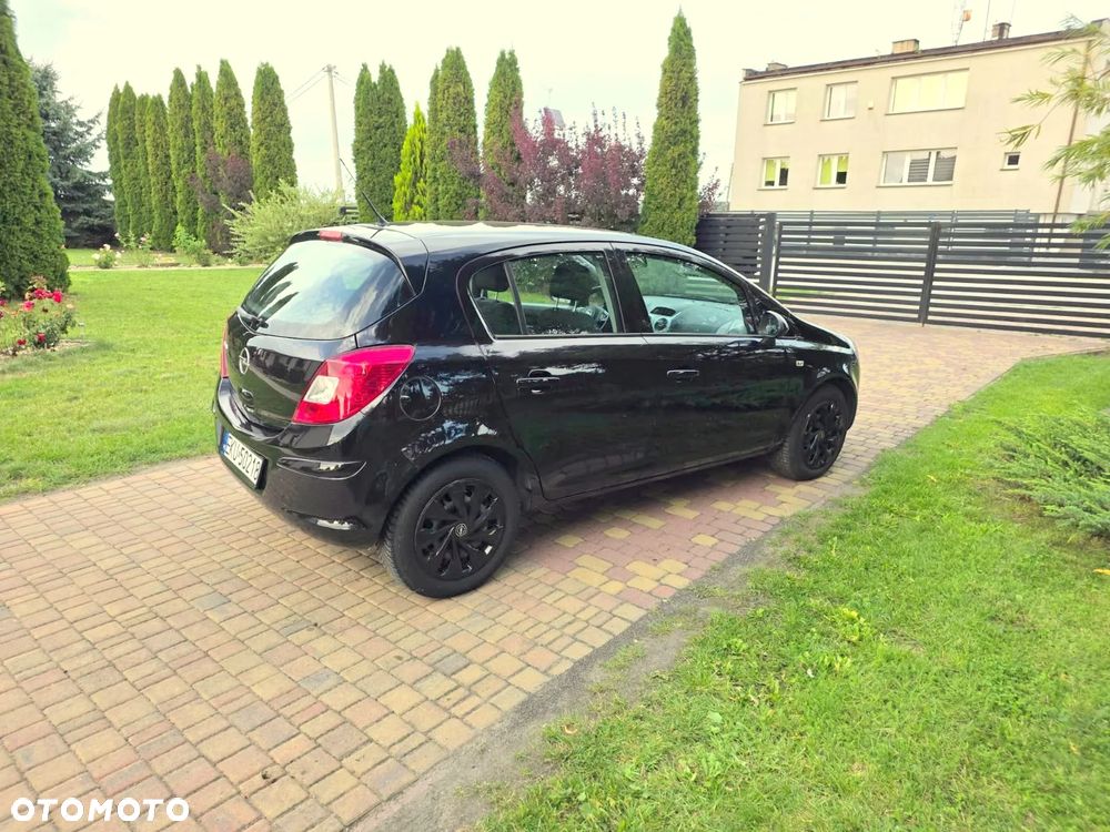 Opel Corsa 1.4 16V Enjoy - 13