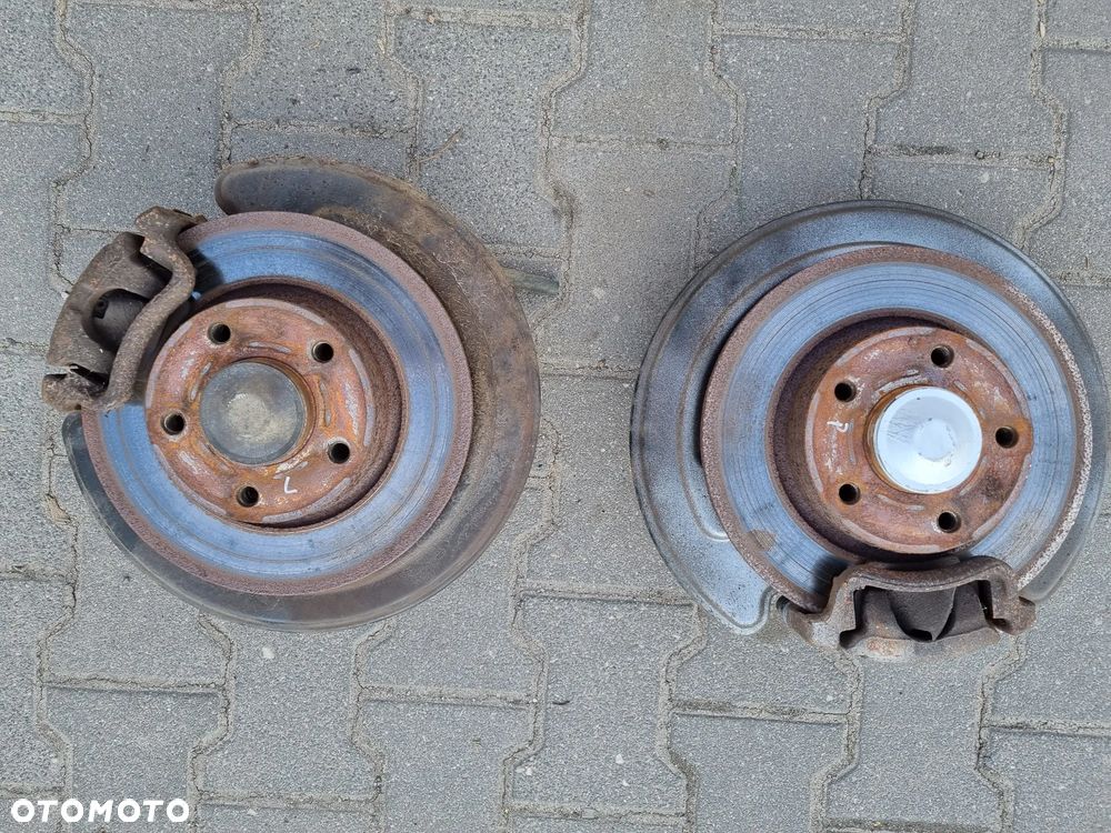 PIASTA TARCZA ZACISK HAMULCOWY TYŁ PRIMASTAR TRAFIC VIVARO 01-14r. - 1