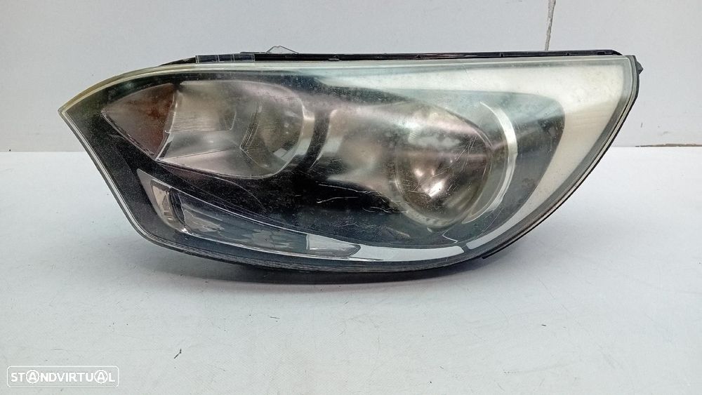 Ótica / farol esquerda KIA Rio III (UB) - 1