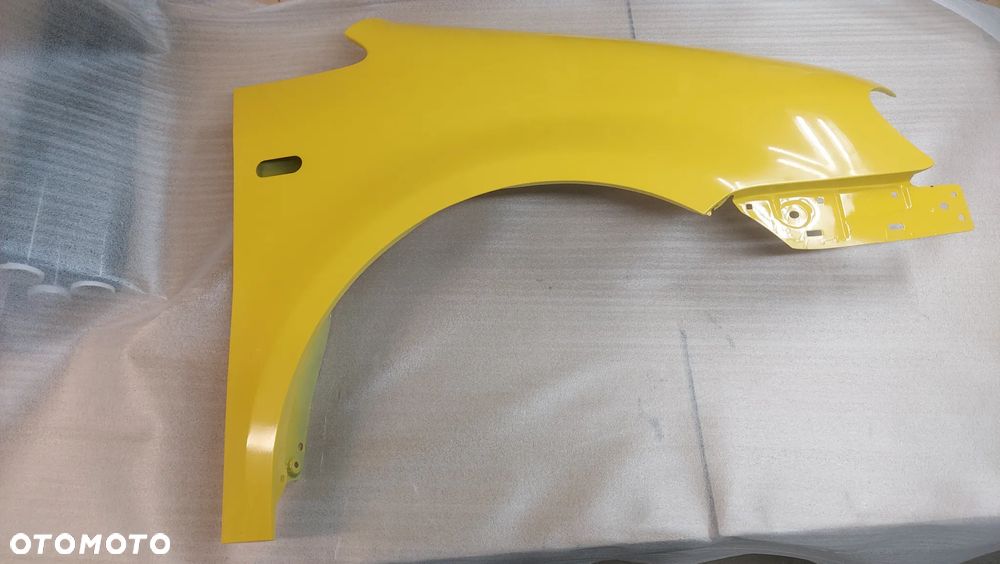 VW CADDY III 3 2K 04-10r BŁOTNIK LEWY LUB PRAWY R132 CYNK. - 2