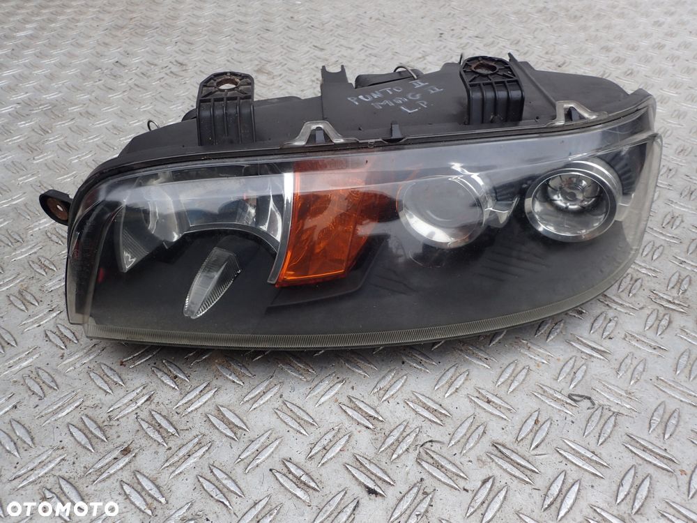 LAMPA LEWY PRZÓD FIAT PUNTO II 89101051 RADOM - 1