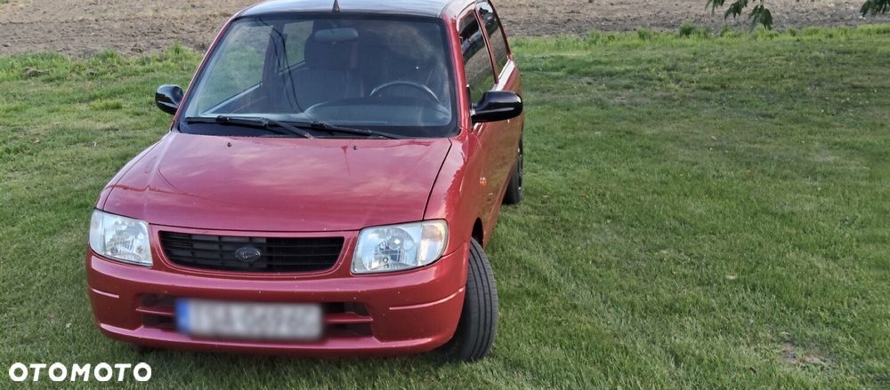 Daihatsu Cuore 1999 photo 2