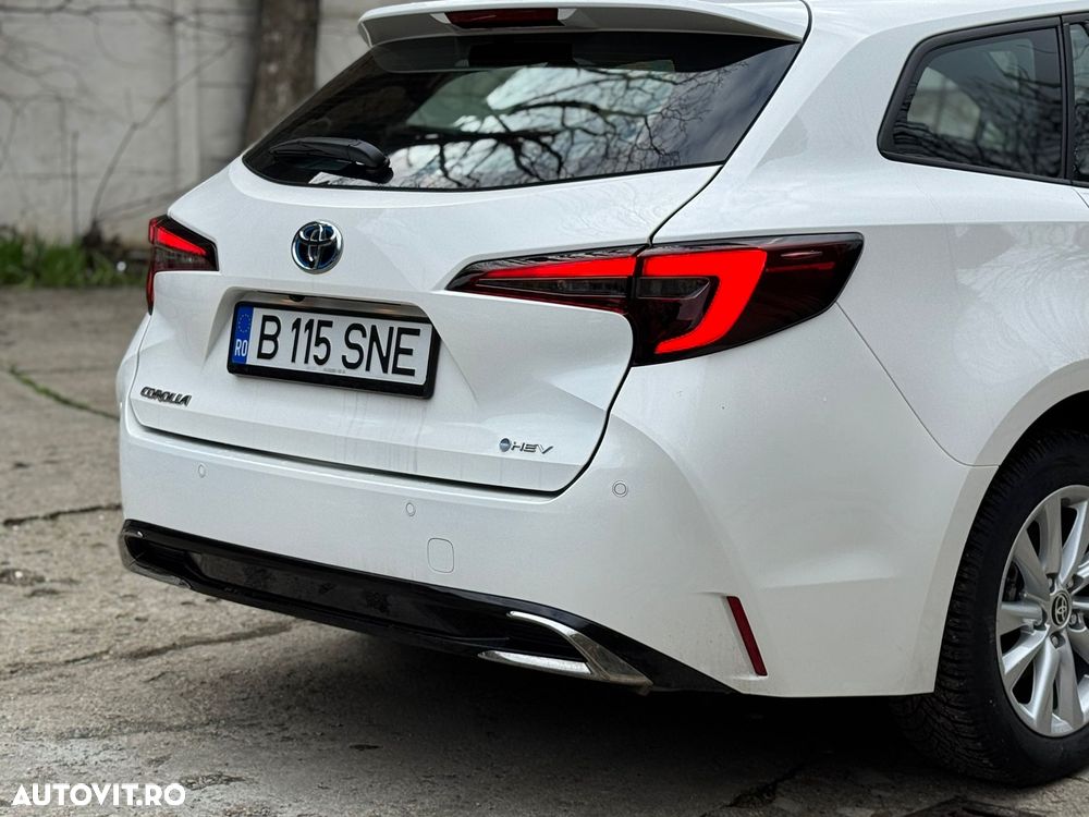 Toyota Corolla 1.8 HSD Business - 7