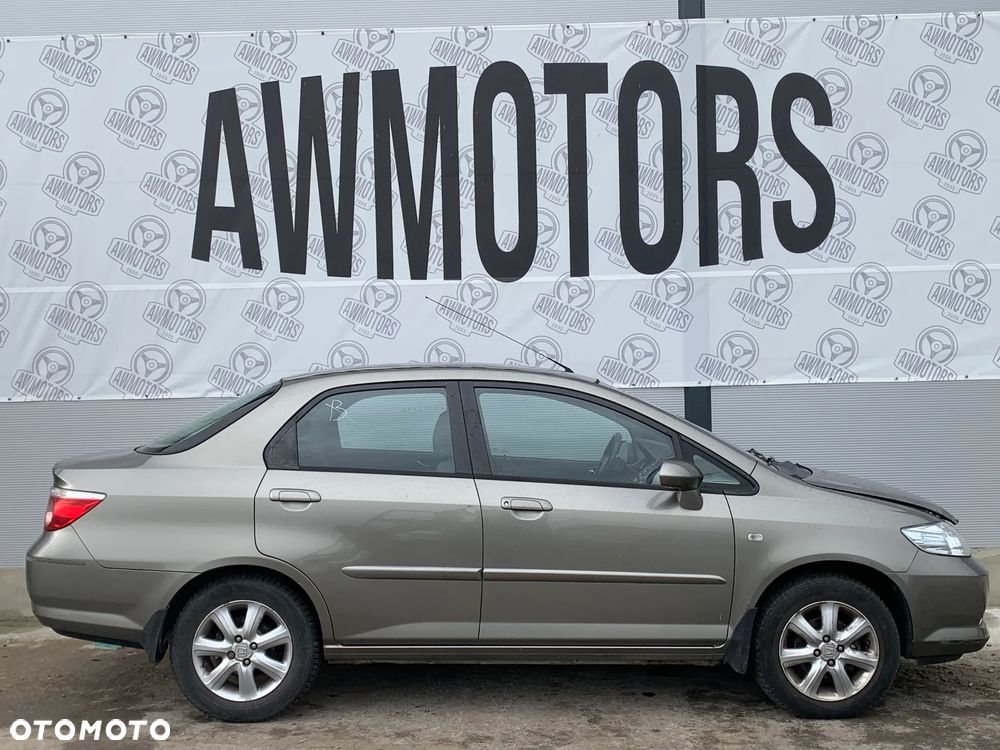 HONDA CITY 2007 *SAMOCHÓD NA CZĘŚCI* 2587  MASKA, LAMPA, DRZWI, LUSTERKO, ZDERZAK, GRILL, BŁOTNIK, KLAPA, BELKA, DESKA, FOTELE, KANAPA, ĆWIARTKA, KIEROWNICA, TARCZE, ZACISKI, ZAWIESZENIE, KOMPLETNY PRZÓD, KOMPLETNY TYŁ, LICZNIK, ZEGARY, PRAWE LEWE PRZÓD TYŁ - 1