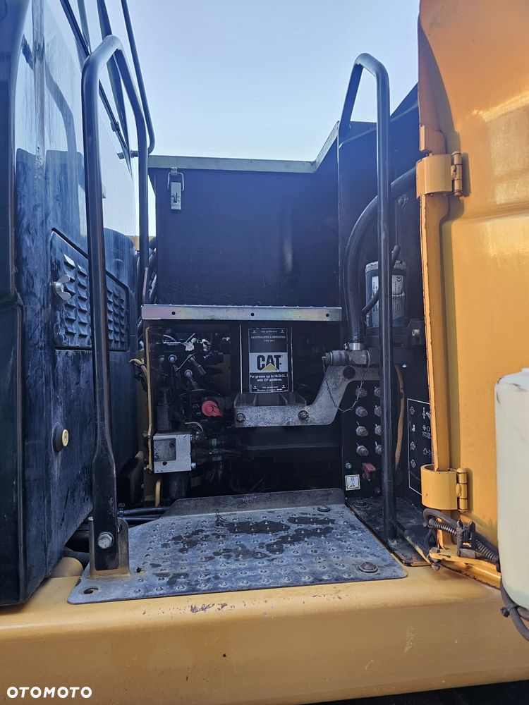 Caterpillar M313D - 21