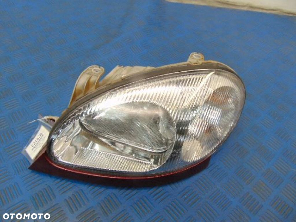 DAEWOO LANOS SEDAN REFLEKTOR LEWY - 1