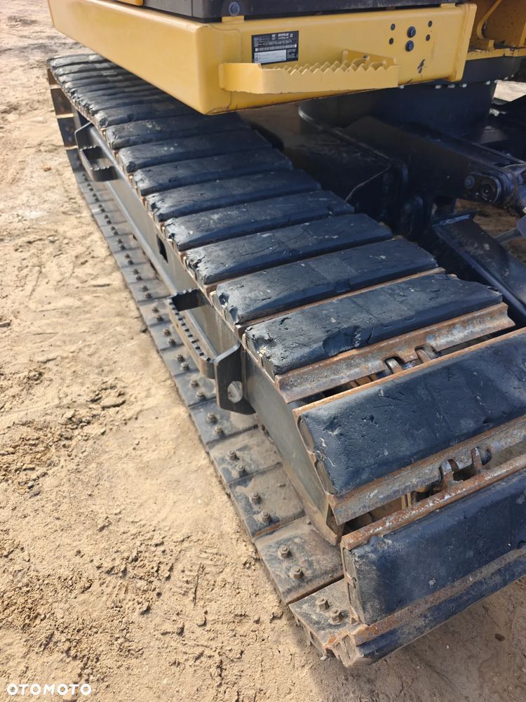 Caterpillar 310 - 7