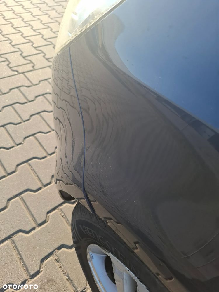 Opel Corsa 1.2 16V Enjoy - 18