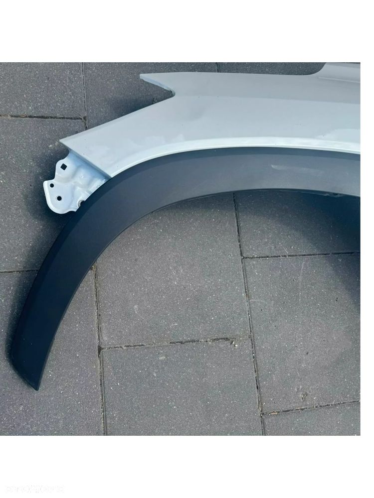 BŁOTNIK PRZÓD PRZEDNI LEWY Z LISTWĄ A89 TOYOTA COROLLA CROSS - 2