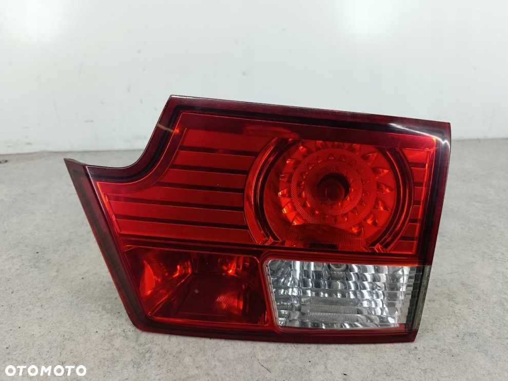 SSANGYONG KYRON PRAWA TYLNA LAMPA KLAPA ORYGINAŁ 83604-09 - 1