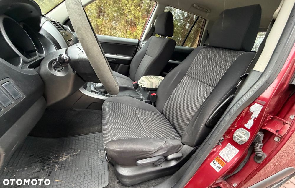 Suzuki Grand Vitara 2.0 Comfort + - 9