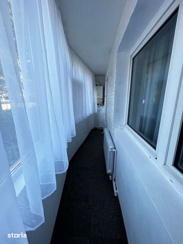 Apartament 2 camere, semidecomandat, balcon, grădină, parter, renovat — fotografia 3