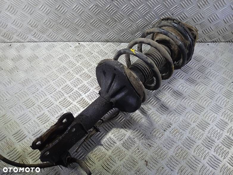 AMORTYZATOR PRAWY PRZEDNI SPRĘŻYNA KIA CARNIVAL - 2