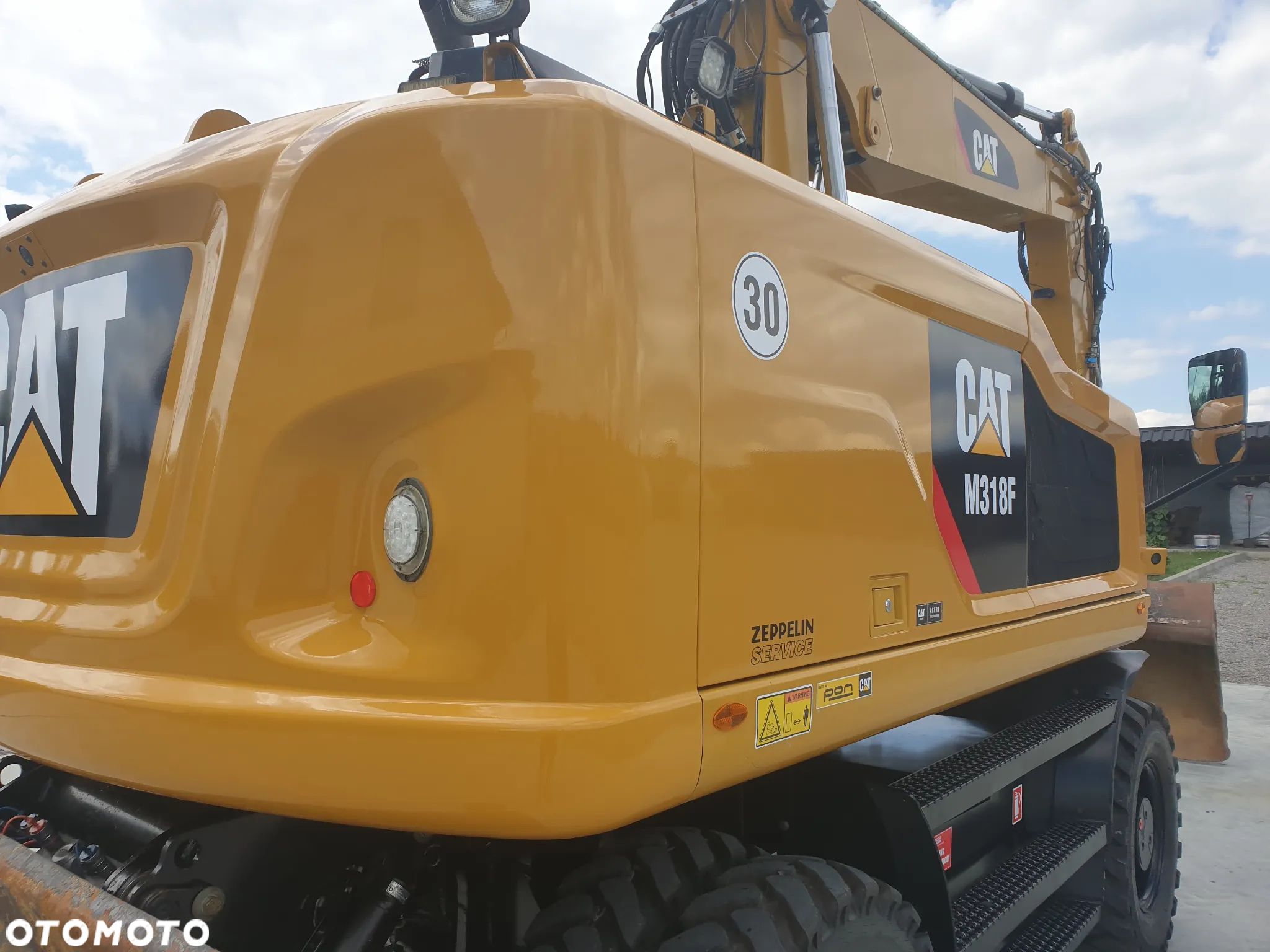 Caterpillar M 318 F ROTOTILT SPROWADZONY ŁADNY STAN - 8