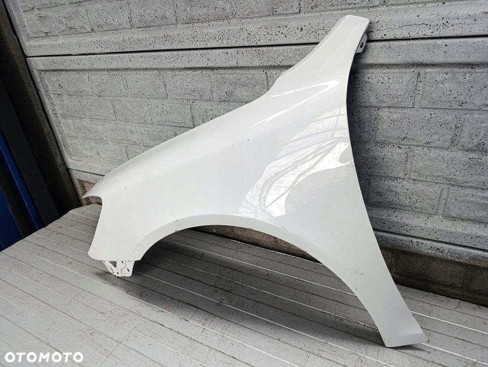 skoda octavia ii 2 lift 08-13 błotnik lewy przód oryginał - 3