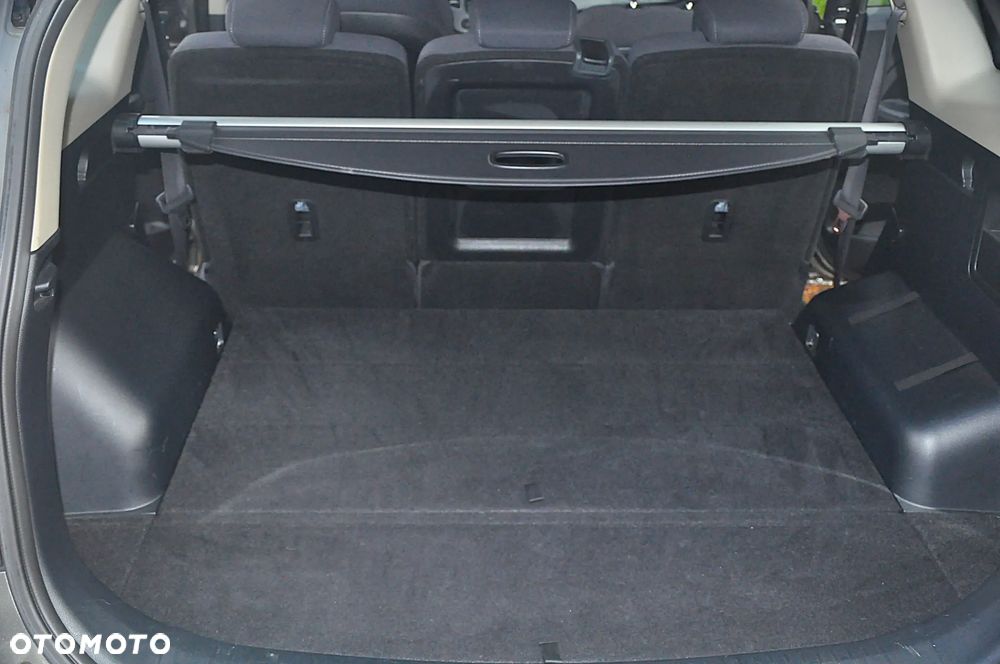 Kia Carens - 13