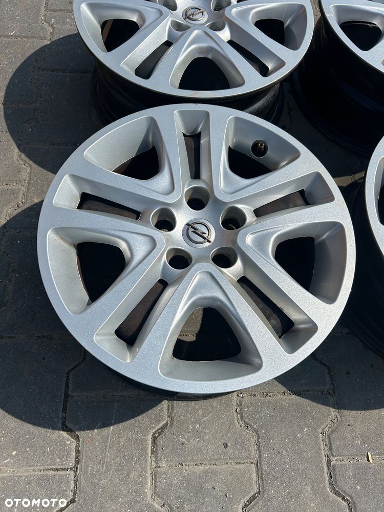 Opel Astra K Felgi stalowe strukturalne kołpaki 16 cali 5x105 - 9