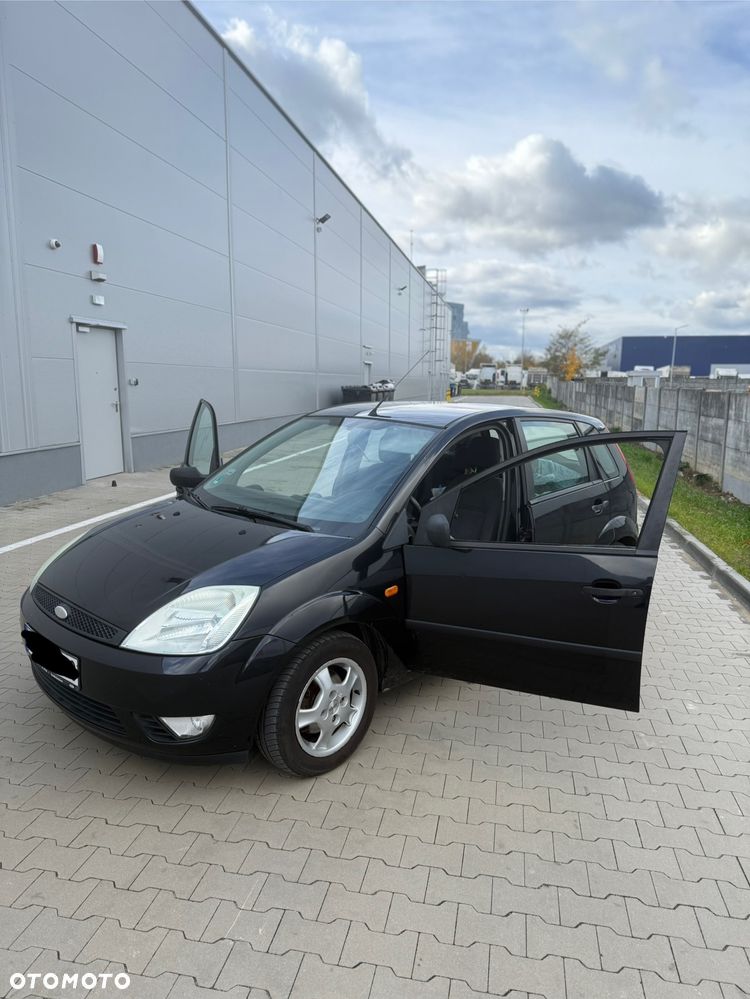 Ford Fiesta 1.4 Ghia - 9