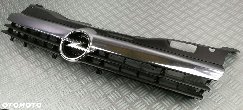 13108463 13135487 grill logo atrapa chłodnic OPEL ASTRA H III 3 2003-2007r - 2
